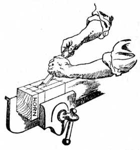 Fig. 184.&mdash;Removing Waste of Mortise with Chisel.