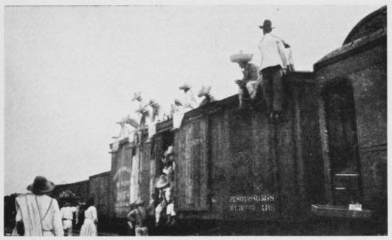 AN ESCORT OF SOLDIERS OCCUPIED A FREIGHT CAR AHEAD AS A
PRECAUTION AGAINST BANDITS